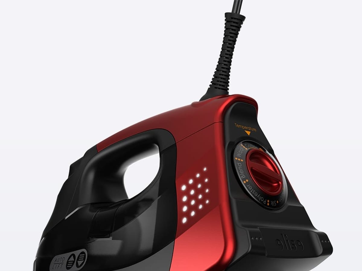 Oliso auto-lift smart iron in red and black, showing its temperature dial
